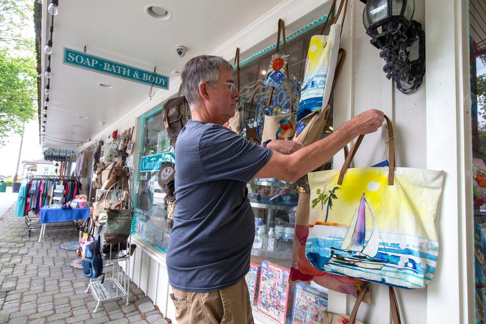 Steve Mandeville, owner, displays bags for sale outside Comfort Zone in Ocean Grove, NJ Friday, May 20, 2022. 