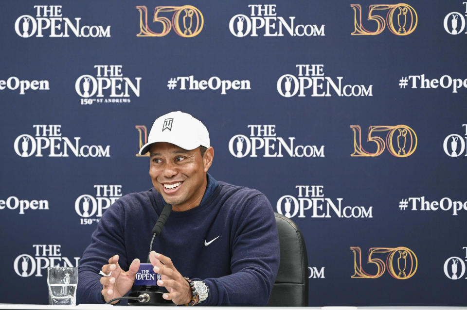 ST ANDREWS, SCOTLAND - JULY 12:  Tiger Woods smiles during a press conference following practice for The 150th Open Championship on The Old Course at St Andrews on July 12, 2022 in St. Andrews, Scotland. (Photo by Keyur Khamar/PGA TOUR via Getty Images)