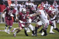 Georgia linebacker Azeez Ojulari (13) sacks South Carolina quarterback Luke Doty (4) during the first half of an NCAA college football game Saturday, Nov. 28, 2020, in Columbia, S.C. (AP Photo/Sean Rayford)