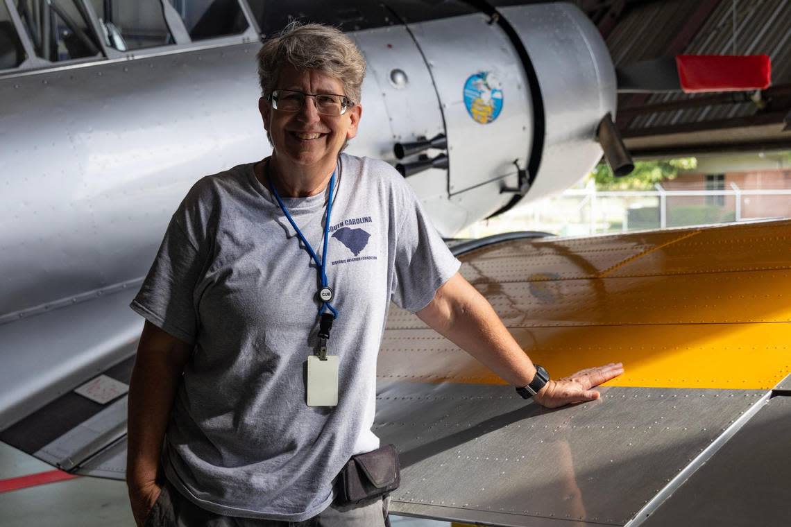 Katherine Cuddy show a restored B-25c at Owens Field Airport on Monday, August 7, 2023. Cuddy attended an open house at the hangar and decided to volunteer and help with the restoration.