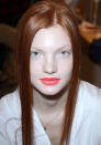 <b>Behind-the-scenes at Oscar de la Renta's AW13 New York Fashion Week show</b><br><br>Models showcased bold, coral lips on porcelain skin backstage at the show.<br><br>©Rex<br>