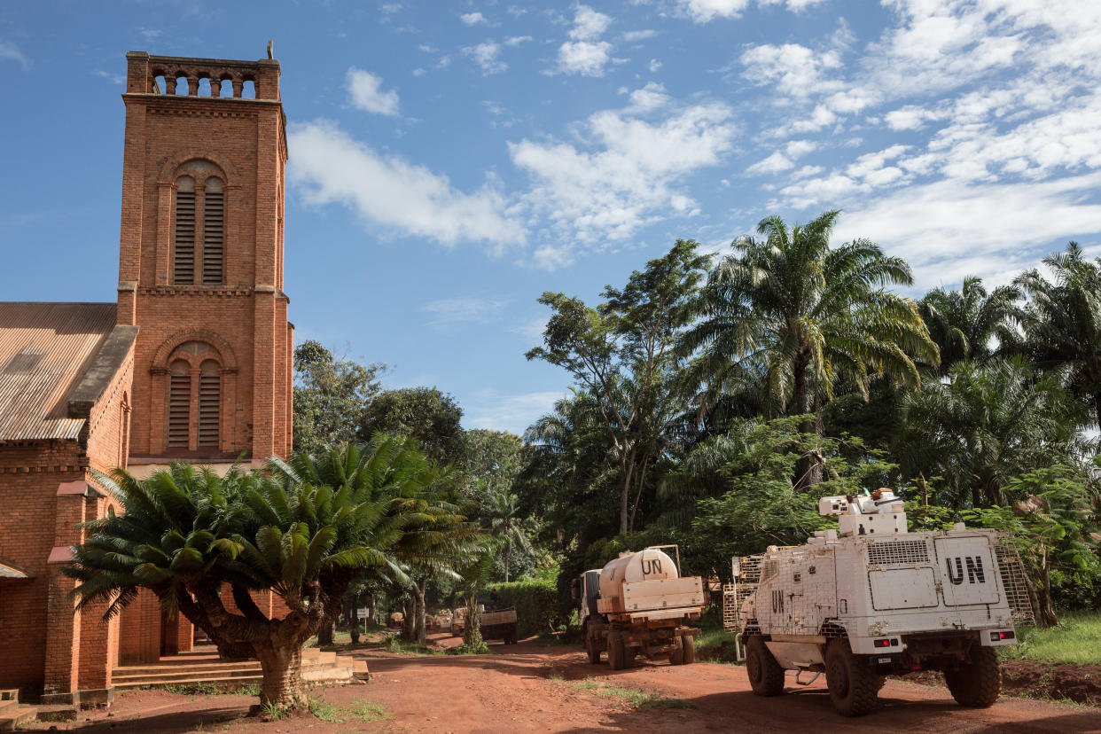 MINUSCA’s armored vehicles and tankers operate next to the cathedral of Bangassou in southeastern Central African Republic on Aug. 22, 2017. (Photo: Alexis Huguet/AFP/Getty Images)