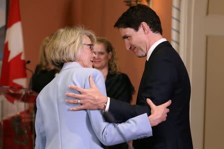 Canada's Prime Minister Justin Trudeau congratulates Joyce Murray after she was sworn-in as Canada's President of the Treasury Board and Minister of Digital Government during a cabinet shuffle at Rideau Hall in Ottawa, Ontario, Canada, March 18, 2019. REUTERS/Chris Wattie