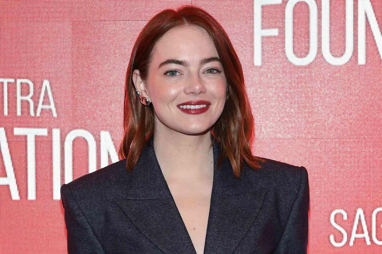 <p>Dimitrios Kambouris/Getty Images</p> Emma Stone in New York City on Jan. 25, 2024