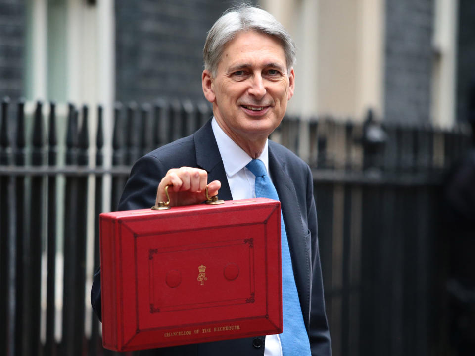 Philip Hammond holds the red case as he departs 11 Downing Street to deliver his budget: Getty Images