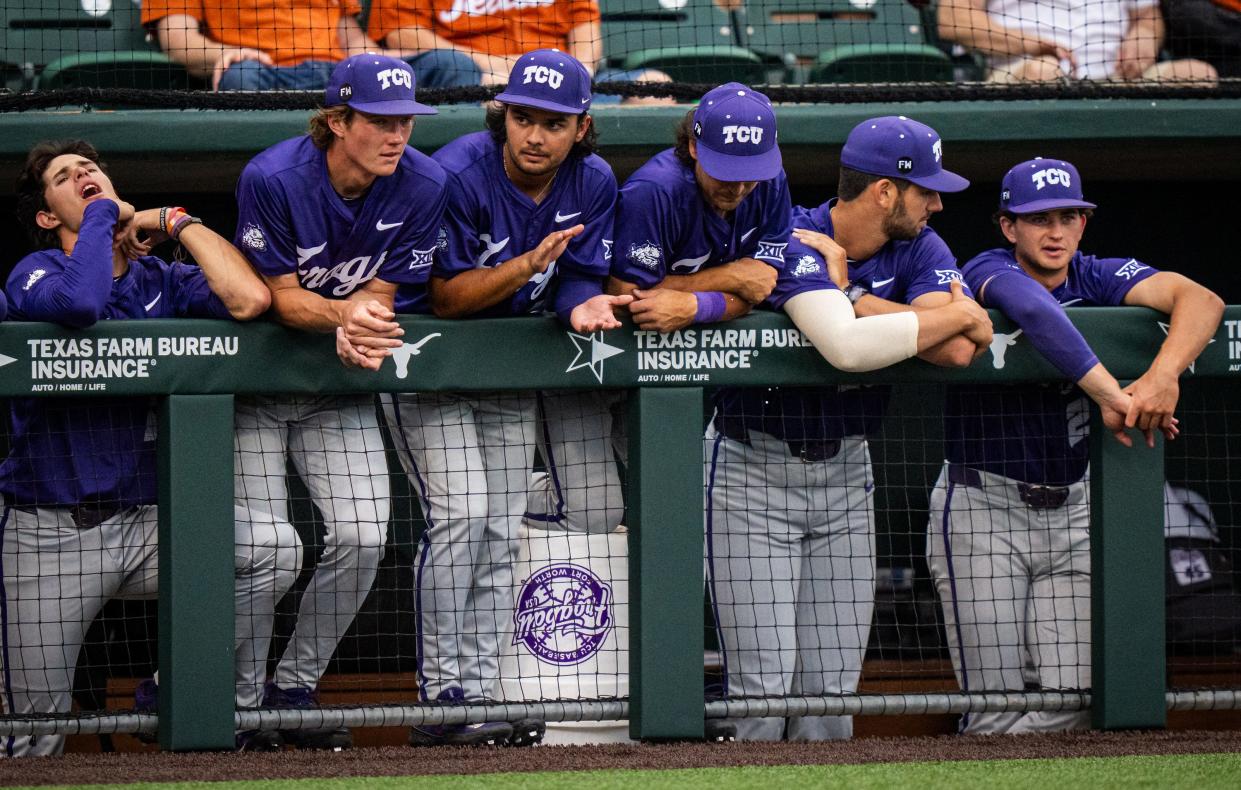 The TCU team watch from the dugout in the third inning of the Texas LonghornsÕ game against the TCU Horned Frogs at UFCU Disch-Falk Field, Friday, April 19, 2024.