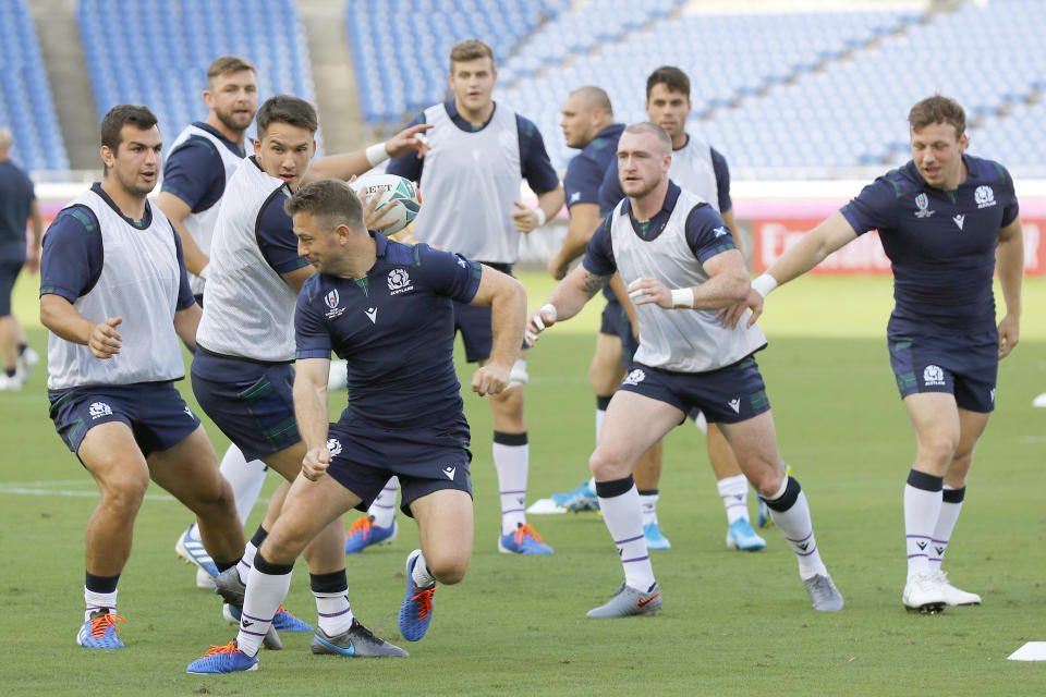 Scotland rugby team members train ahead of their Rugby World Cup match against Ireland, in Yokohama, near Tokyo Friday, Sept. 20, 2019. (Kyodo News via AP)