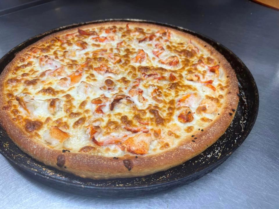 You don't want to miss out on the Lobster Pizza at Village Pizza and Ice Cream.