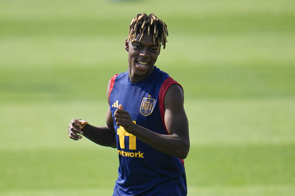 Spain's Nico Williams works out during a training session at Qatar University, in Doha, Qatar, Monday, Nov. 21, 2022. Spain will play its first match in Group E in the World Cup against Costa Rica on Nov. 23. (AP Photo/Julio Cortez)