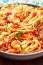 <p>When it comes to <a href="https://www.delish.com/uk/pasta-recipes/" rel="nofollow noopener" target="_blank" data-ylk="slk:pasta;elm:context_link;itc:0;sec:content-canvas" class="link ">pasta</a> we want something simple and fast. Pasta Pomodoro is a step above from <a href="https://www.delish.com/uk/cooking/recipes/a28868982/best-spaghetti-and-meatballs-recipe/" rel="nofollow noopener" target="_blank" data-ylk="slk:Spaghetti and Meatballs;elm:context_link;itc:0;sec:content-canvas" class="link ">Spaghetti and Meatballs</a> and highlights the freshness of tomatoes — pomodoro means 'tomato' in Italian. You're cooking down the tomatoes just enough to form a light sauce but keeping most of them intact. It's the freshest pasta and is best enjoyed outside with a mound of grated Parmesan. </p><p>Get the <a href="https://www.delish.com/uk/cooking/recipes/a32000915/pasta-pomodoro-recipe/" rel="nofollow noopener" target="_blank" data-ylk="slk:Pasta Pomodoro;elm:context_link;itc:0;sec:content-canvas" class="link ">Pasta Pomodoro</a> recipe.</p>