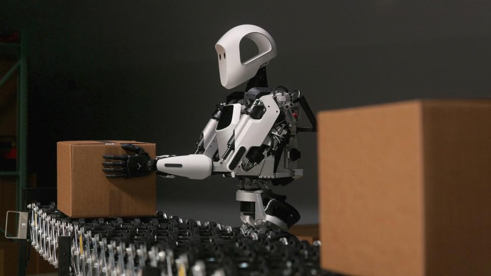 Apptronik's Digit robot moving a package using its hands