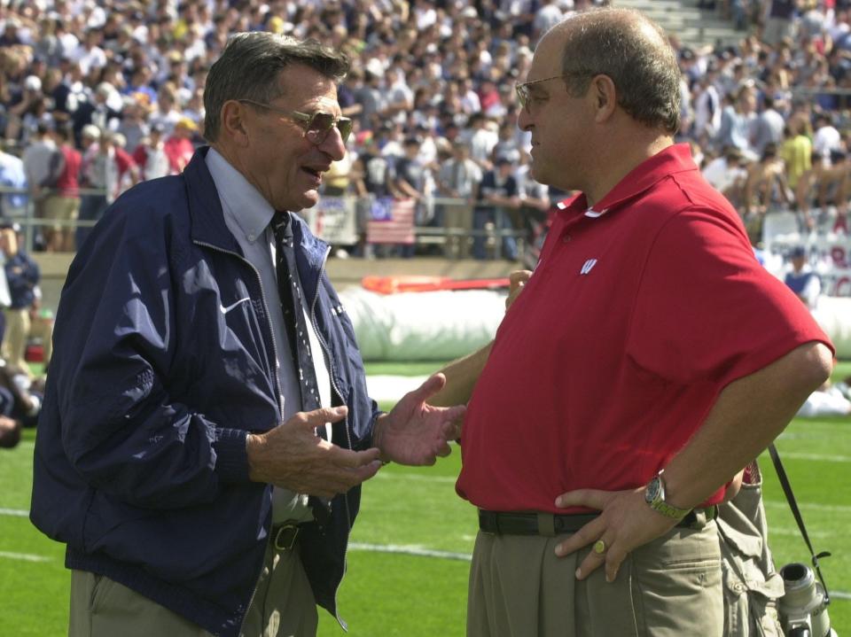 Penn State Coach Joe Paterno talks with wisconsin coach Barry Alvarez before the start of the game. The Wisconsin Badgers beat the Penn State Nittney Lions, 18-6, before 105,000 fans at Beaver Stadium in State College, Pennsylvania, Saturday, Sept. 22, 2001. Journal Sentinel Photo by RICK WOOD