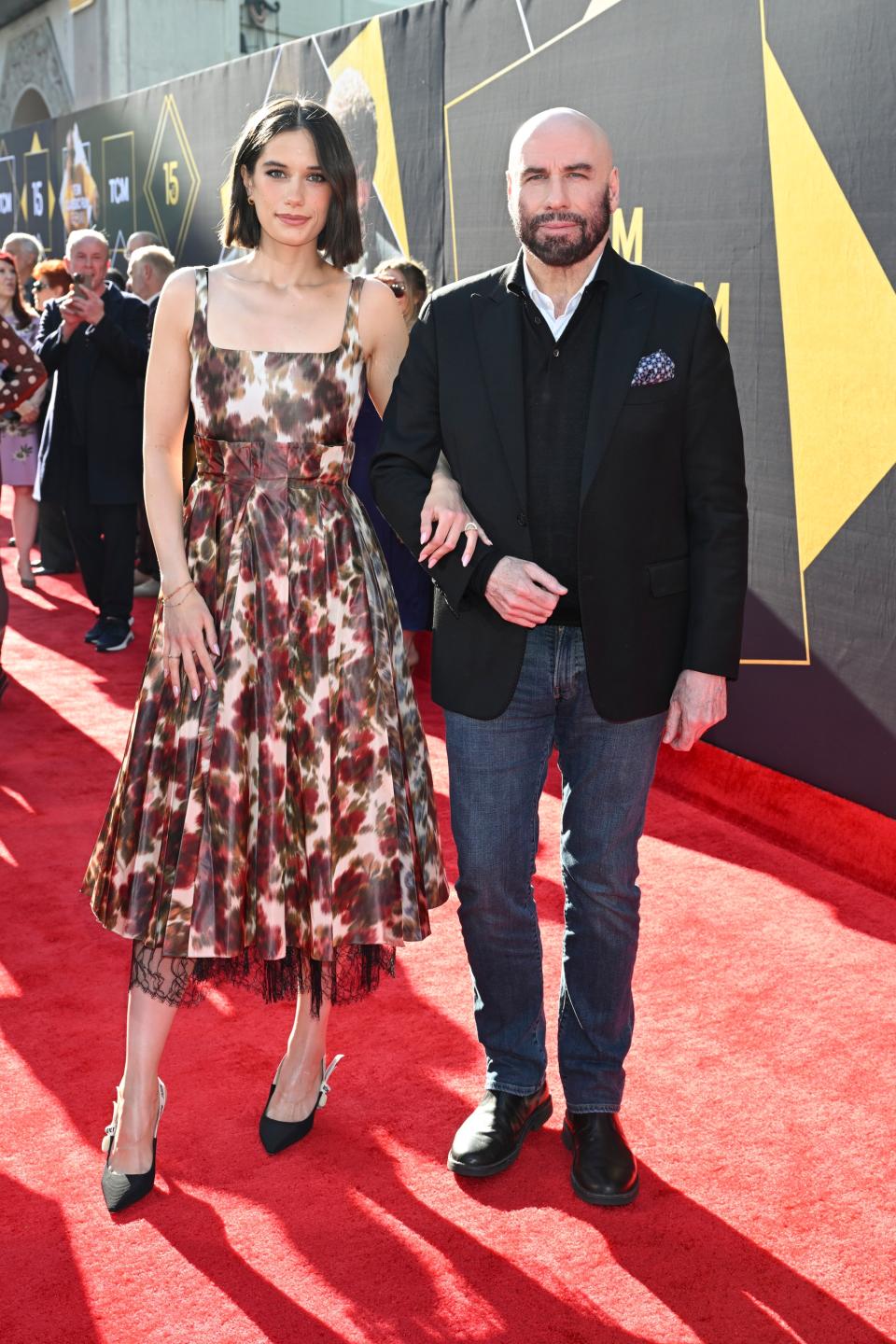 john travolta daughter Ella Bleu Travolta, at left, and John Travolta at the 2024 TCM Classic Film Festival Opening Night screening of "Pulp Fiction" on April 18, 2024.