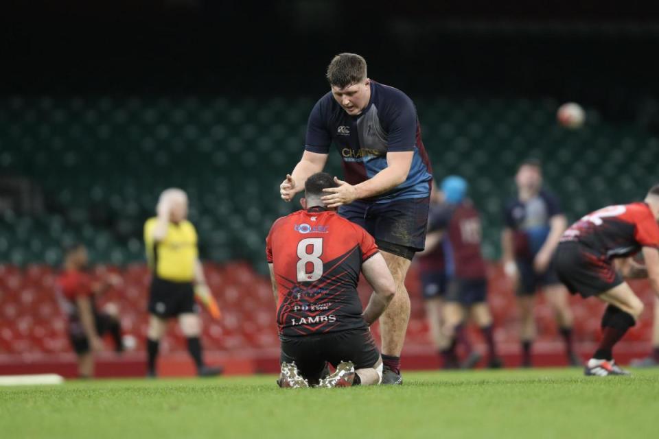 CLOSE: Blaina's Ellis Evans is consoled at the final whistle <i>(Image: Huw Evans Agency)</i>