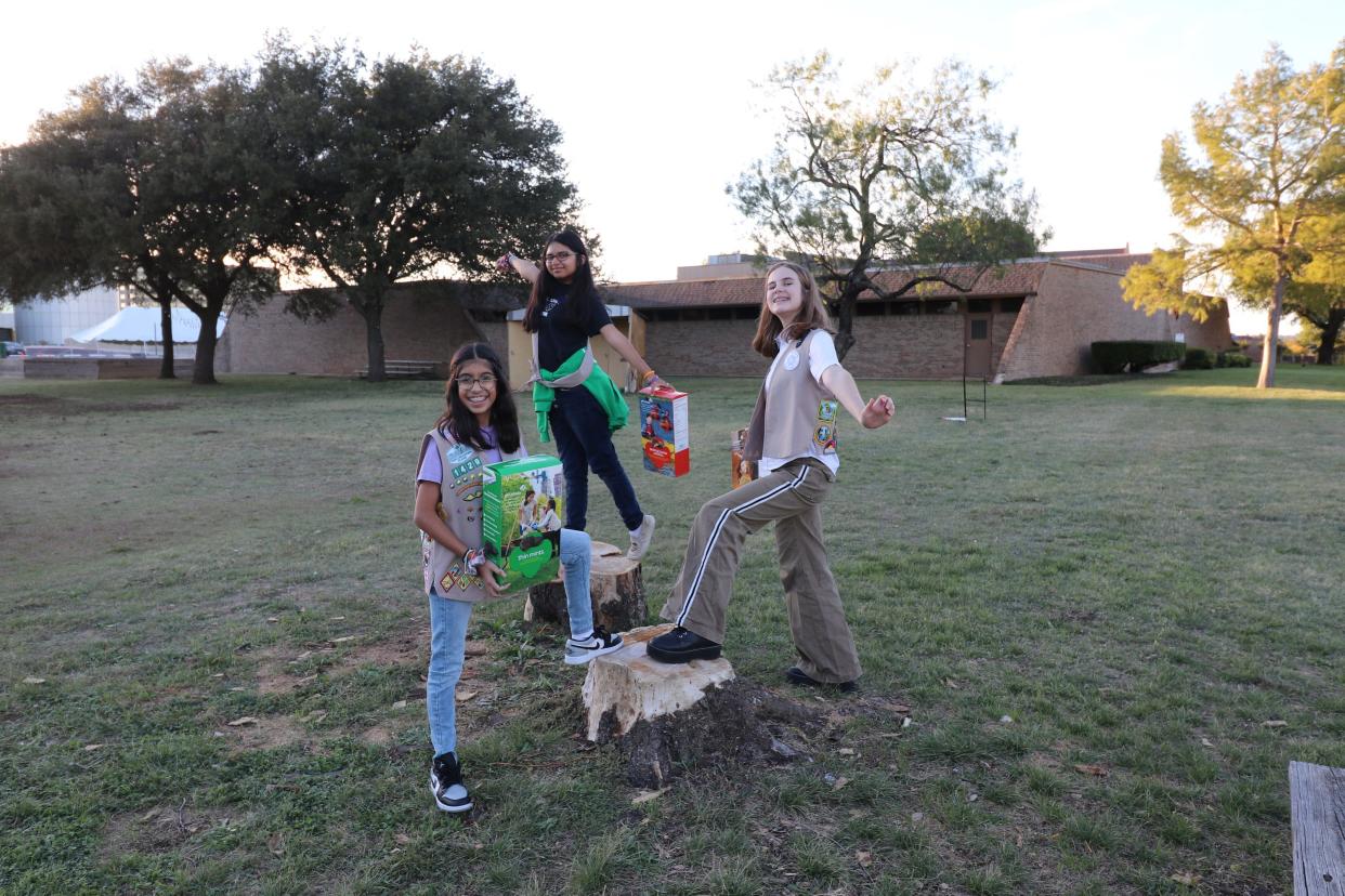 Members of the Girl Scouts of the Oklahoma Texas Plains Media Corp posing with boxes of Girl Scout Cookies on Jan. 3, 2023. The top three flavors in Lubbock in 2023 were Thin Mints, Caramel Delites and Peanut Butter Patties.