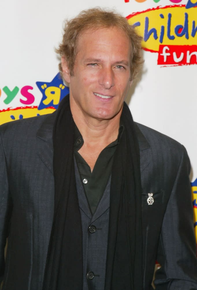  Singer Michael Bolton attends the Toys R' Us Children Fund 18th Annual Benefit Dinner at the Marrriot Marquis April 9, 2003 in New York City. 