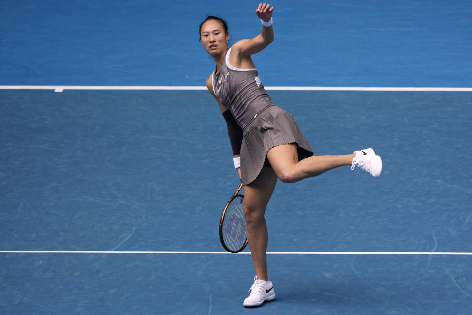 Zheng Qinwen of China reacts during her second round match against Laura Siegemund of Germany at the Australian Open tennis championship in Melbourne, Australia, Wednesday, Jan. 15, 2025. (AP Photo/Asanka Brendon Ratnayake)