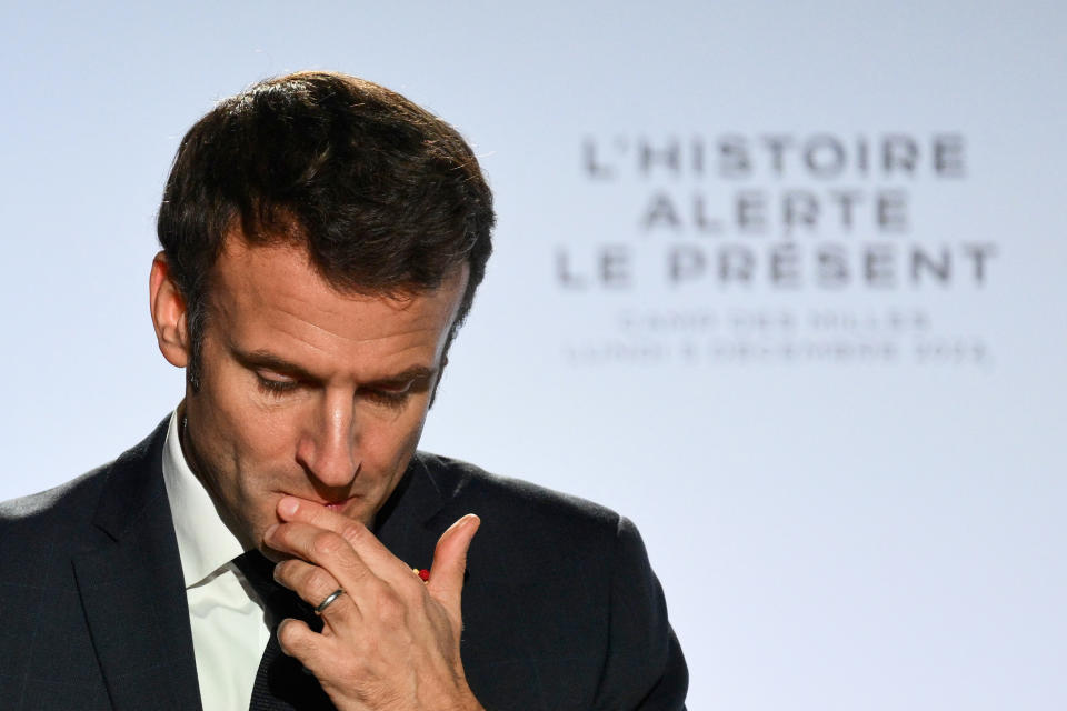 French President Emmanuel Macron pauses as he delivers a speech at the Camp des Milles memorial site in Aix-en-Provence, southern France, Monday, Dec.5, 2022. French President Emmanuel Macron visits a Nazi internment and deportation camp near Avignon, giving warnings about hate speech and resurgent of antisemitism. (Christophe Simon, Pool via AP)