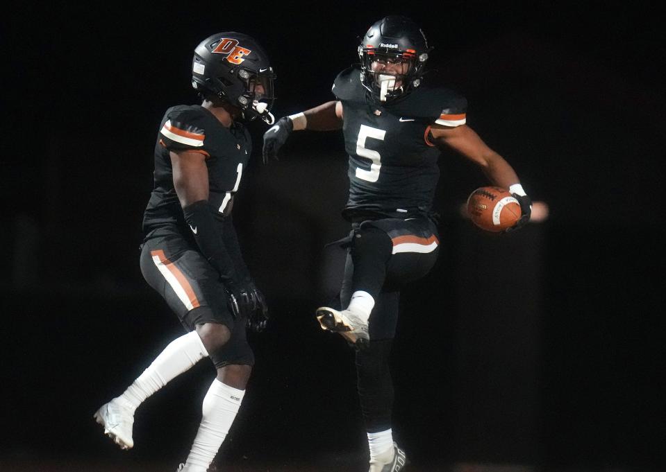 Desert Edge receiver Vinny Mansfield (5) celebrates his touchdown with teammate Kezion Dia-Johnson (1) during their 5A playoff game against Central in Goodyear on Friday, Nov. 18, 2022. 