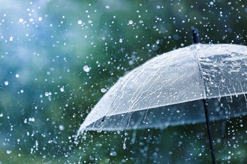   <span class="attribution"><a class="link " href="https://www.shutterstock.com/image-photo/transparent-umbrella-under-rain-against-water-1782656951" rel="nofollow noopener" target="_blank" data-ylk="slk:Julia Sudnitskaya/Shutterstock;elm:context_link;itc:0;sec:content-canvas">Julia Sudnitskaya/Shutterstock</a></span>