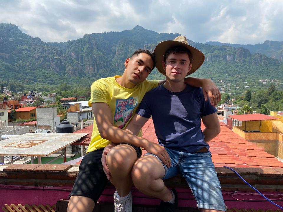 Leonardo Hernandez and his partner, Thomas, Woman sprays 'holy water' on gay couple outside Mexico church