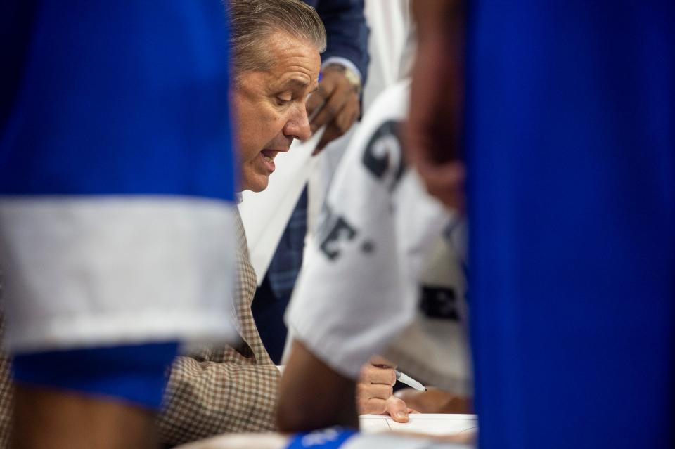 Kentucky Wildcats head coach John Calipari talks with his team during a timeout as Auburn Tigers take on Kentucky Wildcats at Neville Arena in Auburn, Ala., on Saturday, Feb. 17, 2024. Kentucky Wildcats lead Auburn Tigers 39-29 at halftime.