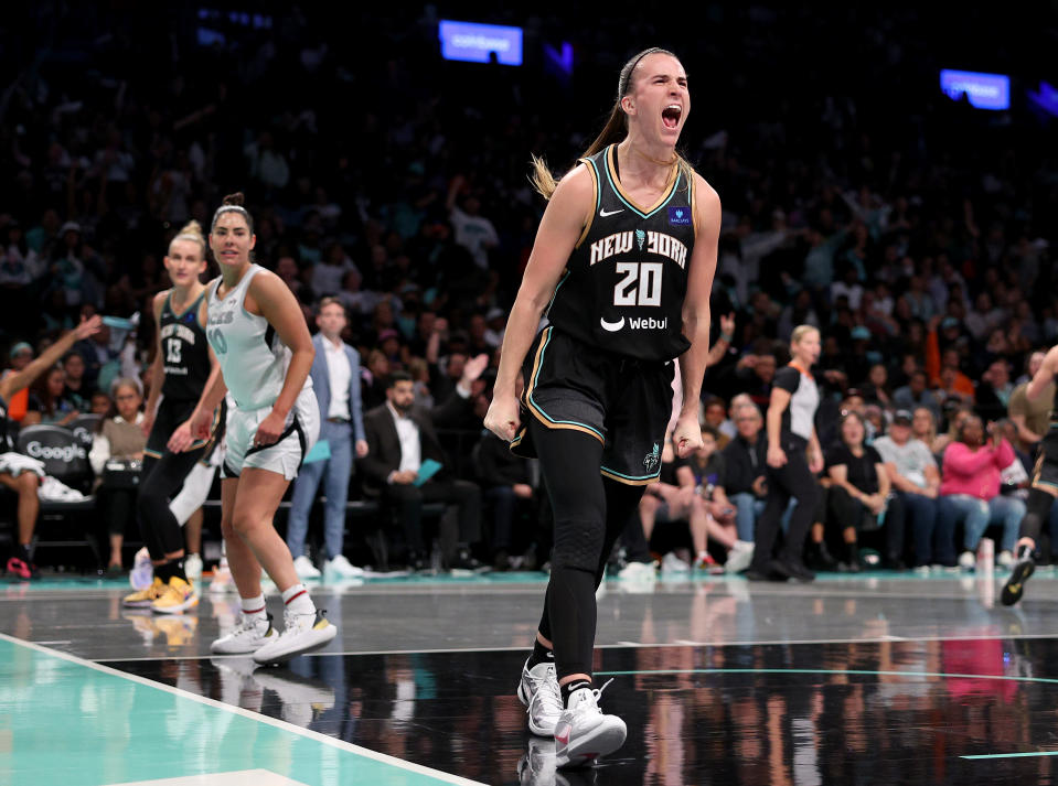 NEW YORK, NEW YORK - OCTOBER 01: Sabrina Ionescu #20 of the New York Liberty celebrates a turnover in the first half of Game Two of the WNBA Semifinals against the Las Vegas Aces at Barclays Center on October 01, 2024 in New York City. NOTE TO USER: User expressly acknowledges and agrees that, by downloading and or using this photograph, User is consenting to the terms and conditions of the Getty Images License Agreement. (Photo by Elsa/Getty Images)