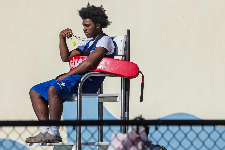 A lifeguard is featured at the Joseph R. Biden, Jr. Aquatic Center on a hot summer day that reached over 78 degrees in Wilmington, Friday, June 28, 2024.