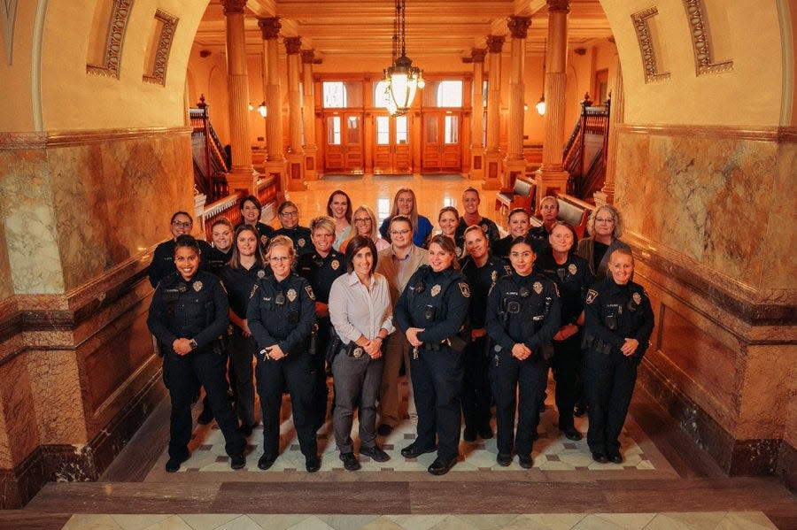 These 23 female Topeka police officers shown in a photo taken at the Kansas Statehouse are among 35 women officers employed by the department. Thirteen percent of Topeka's police officers are women, but that's close to average for cities of Topeka's size.