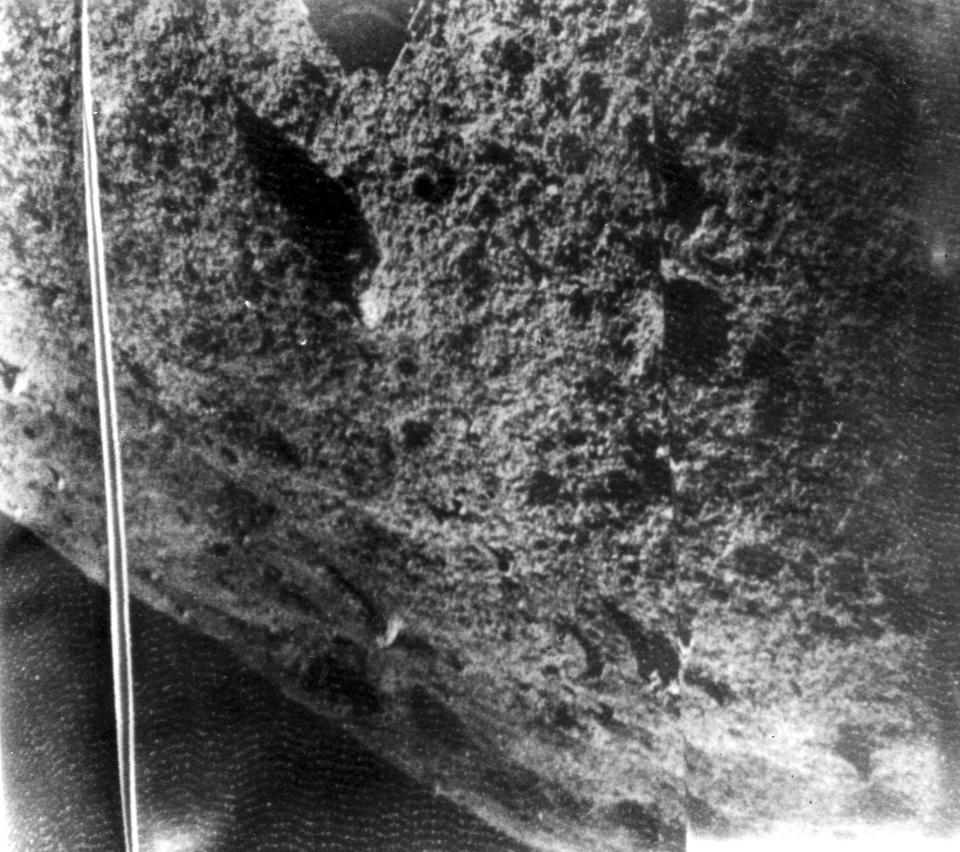 FILE- Picture shows the moon's surface taken by the Russian moonprobe Luna 9, Feb. 4, 1966. The pictures for the first time enable scientists to analyze the microstructure of the moon's surface. The picture was released by the radio telescope at Jodrell Bank Observatory in Cheshire, England, which picked up Luna 9's signals. (AP Photo/File)