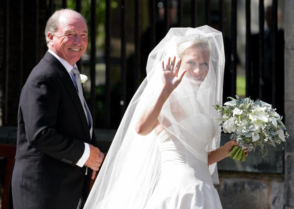 Zara was walked down the aisle by her father, Mark Phillips.