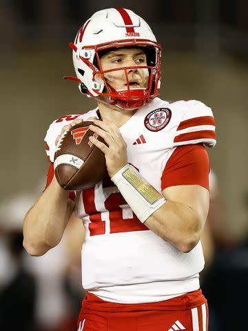 <p>John Fisher/Getty</p> Chubba Purdy #12 of the Nebraska Cornhuskers warms up before the game against the Wisconsin Badgers at Camp Randall Stadium on November 18, 2023.