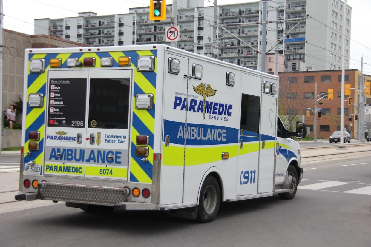 An ambulance on King Street in Kitchener. (Kate Bueckert/CBC - image credit)
