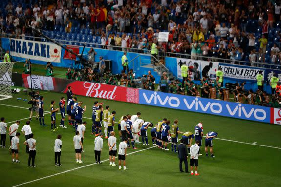 Japan takes a bow on its exit from the World Cup