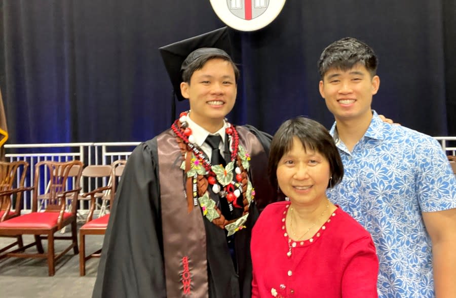 Dennis Chau, left, is seen graduating from Brown University with his mother and brother, Daniel. (Family photo)