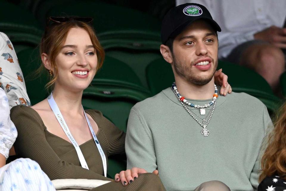 <p>Karwai Tang/WireImage</p> Phoebe Dynevor and Pete Davidson at Wimbledon in July 2021