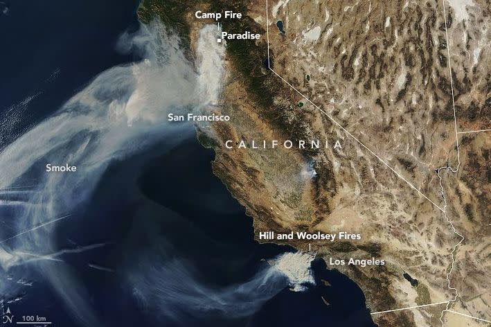 The Camp fire in Northern California has devastated the town of Paradise, while the Hill and Woolsey fires have prompted mass evacuations in Ventura County, north of Los Angeles. (Photo: NASA)