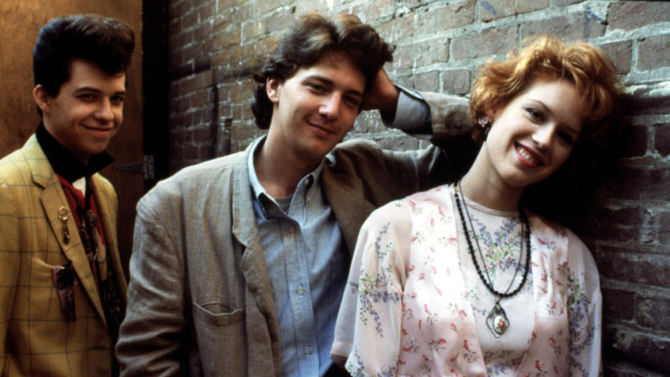 Jon Cryer (Philip F. “Duckie” Dale), Andrew McCarthy (Blane McDonough) and Molly Ringwald (Andie Walsh) in ‘Pretty in Pink’ (1986). - Credit: Everett Collection