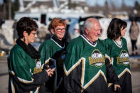 Community members arrive at the Elgar Petersen Arena for a vigil for the Humboldt Broncos in Humboldt, Saskatchewan, Canada April 8, 2018. REUTERS/Matt Smith