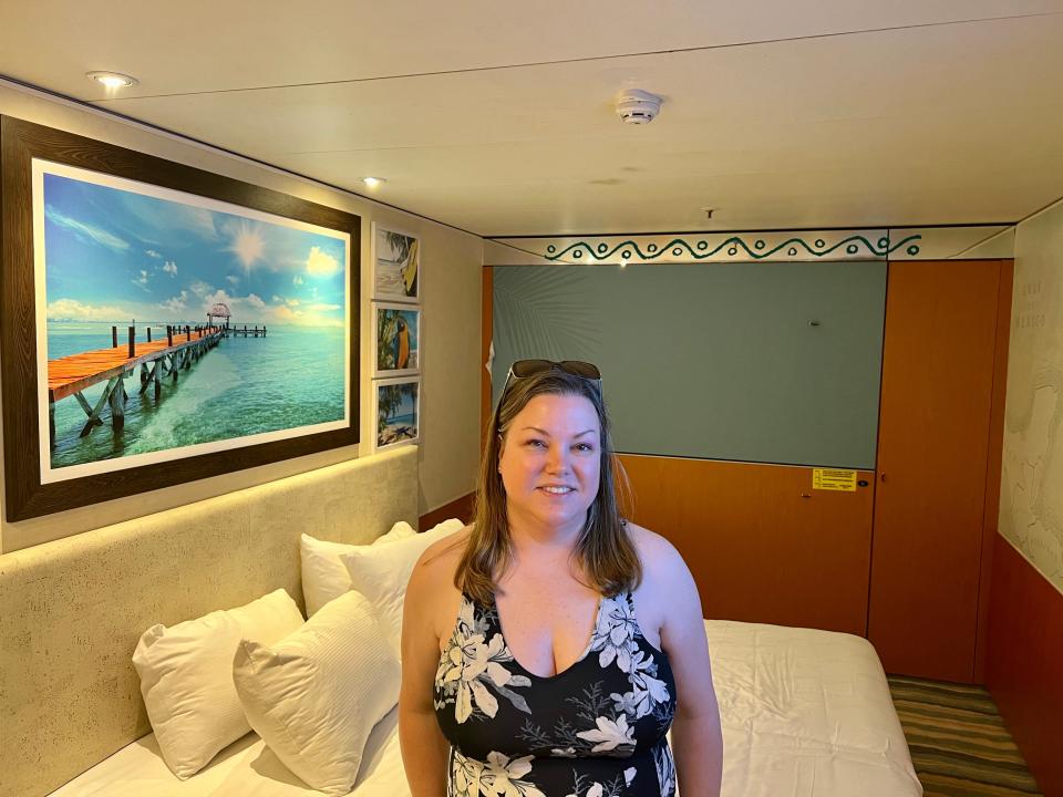 lauren mack sitting in interior stateroom