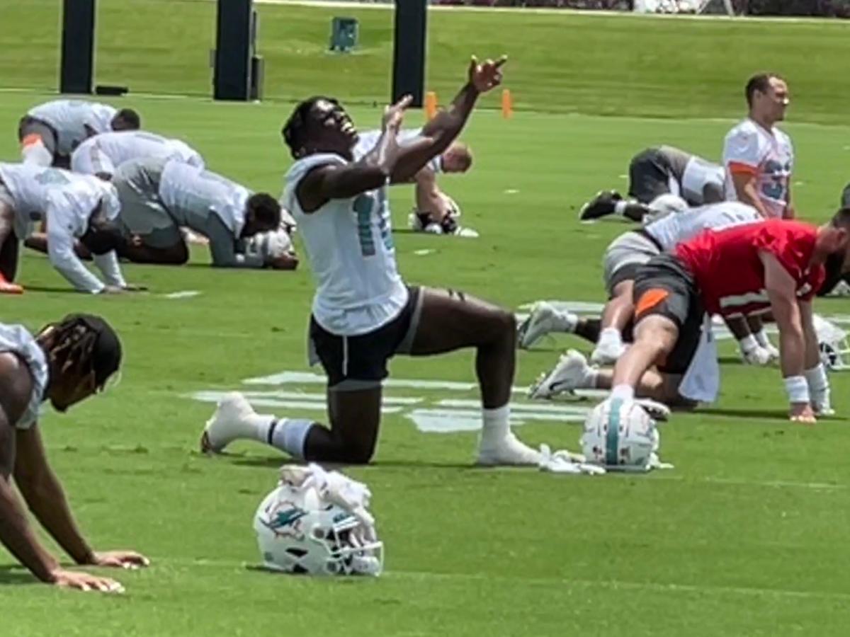 Dolphins orange jersey for practice player of the day tracker