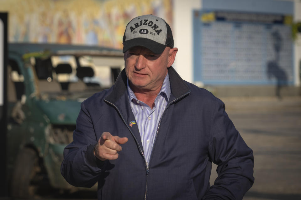 U.S. Sen. Mark Kelly, D-Ariz., answers media questions in Kyiv, Ukraine, Monday, Sept. 18, 2023. (AP Photo/Efrem Lukatsky)