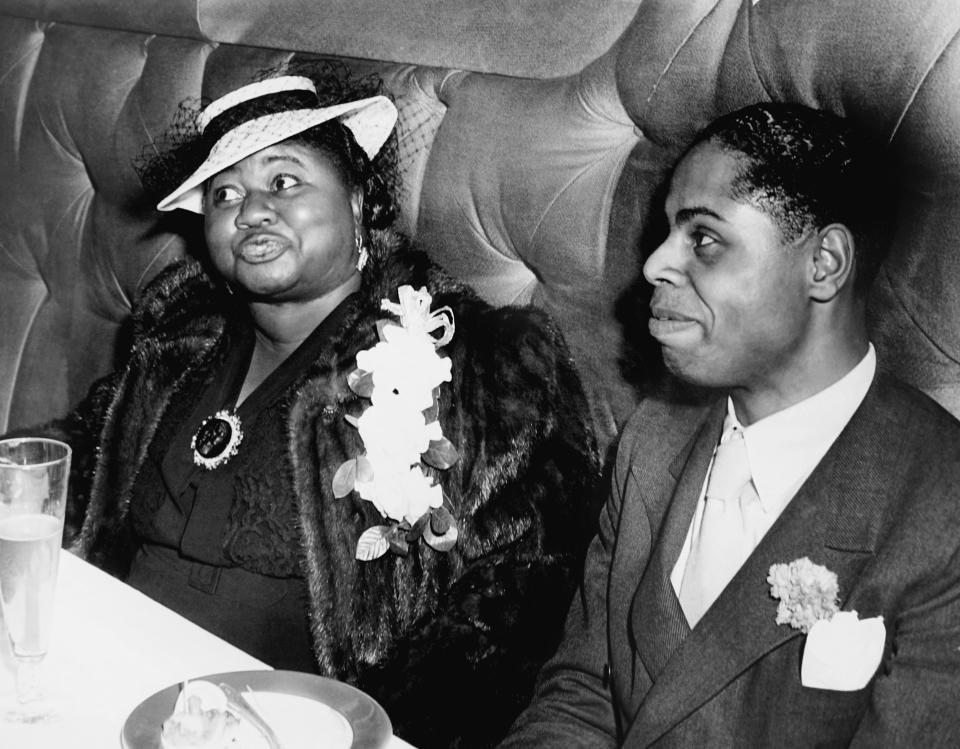 Hattie McDaniel (left) and her agent at Ciro's, 1940