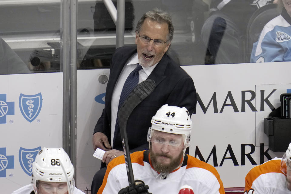 Philadelphia Flyers head coach John Tortorella gives instructions during the first period of an NHL hockey game against the Pittsburgh Penguins in Pittsburgh, Sunday, April 2, 2023. The Penguins won 4-2. (AP Photo/Gene J. Puskar)