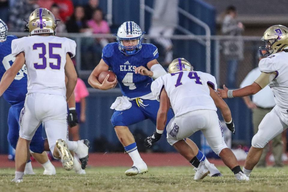 Stratford’s Bryce Braden (4) runs the ball in a District 1-2A Div I game against Panhandle, Friday, October 14, 2022, at Sam Bass Stadium in Stratford. Stratford won 40-35.