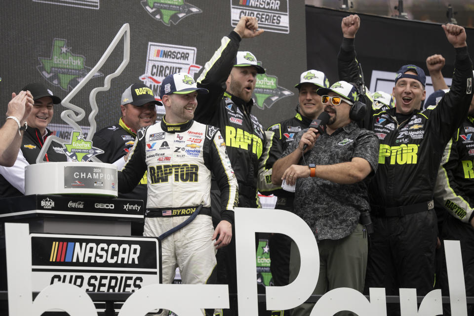 William Byron, third from left, celebrates his win after a NASCAR Cup Series auto race on Sunday, March 24, 2024, at Circuit of the Americas in Austin, Texas. (AP Photo/Darren Abate)