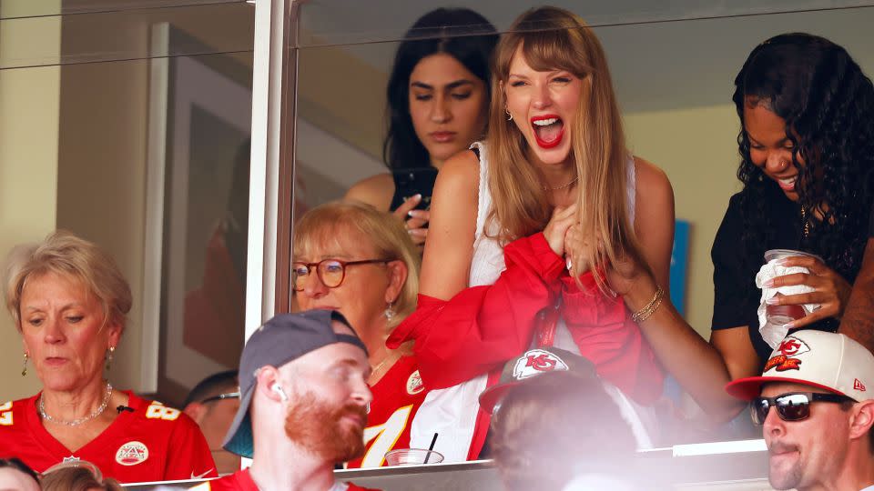 Taylor Swift cheers during a game between the Chicago Bears and the Kansas City Chiefs. Her presence at Chiefs games has incited additional interest in the sport, bringing particular attention to Travis Kelce. - David Eulitt/Getty Images