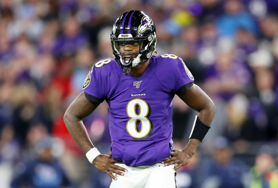 BALTIMORE, MARYLAND - JANUARY 11: Lamar Jackson #8 of the Baltimore Ravens reacts during the first half against the Tennessee Titans in the AFC Divisional Playoff game at M&T Bank Stadium on January 11, 2020 in Baltimore, Maryland. (Photo by Maddie Meyer/Getty Images)