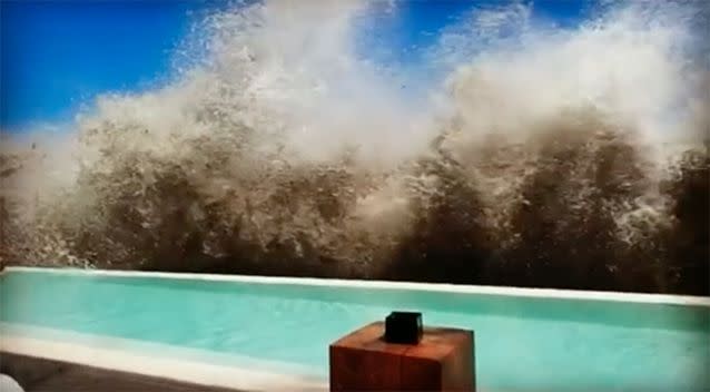 The waves crashed over the pool fence at a resort in Seminyak. Photo: Instagram/bjmarner