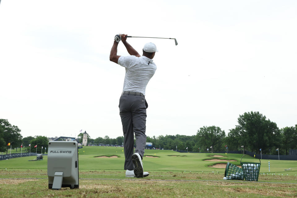 TULSA, OKLAHOMA - MAY 17: Tiger Woods of the United States warms up on the range during a practice round prior to the start of the 2022 PGA Championship at Southern Hills Country Club on May 17, 2022 in Tulsa, Oklahoma. (Photo by Christian Petersen/Getty Images)